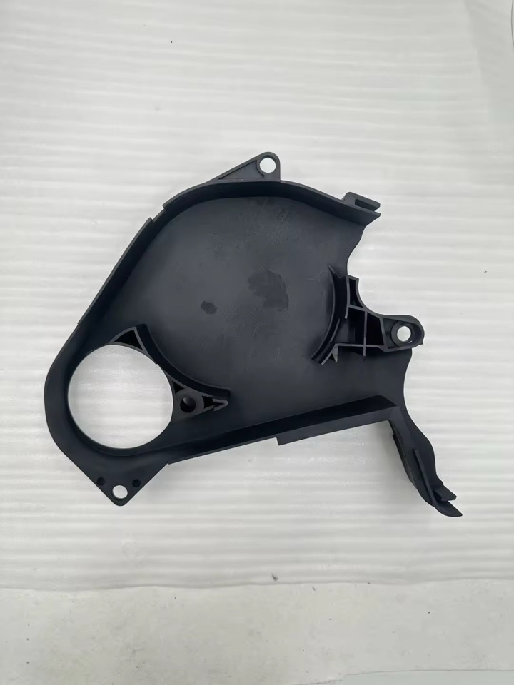 MK2 Golf 16v lower timing cover — front view showing camshaft pulley cutout