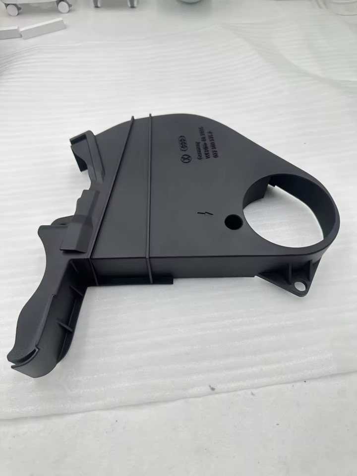 MK2 Golf 16v lower timing cover — isometric view showing side profile and mounting tabs