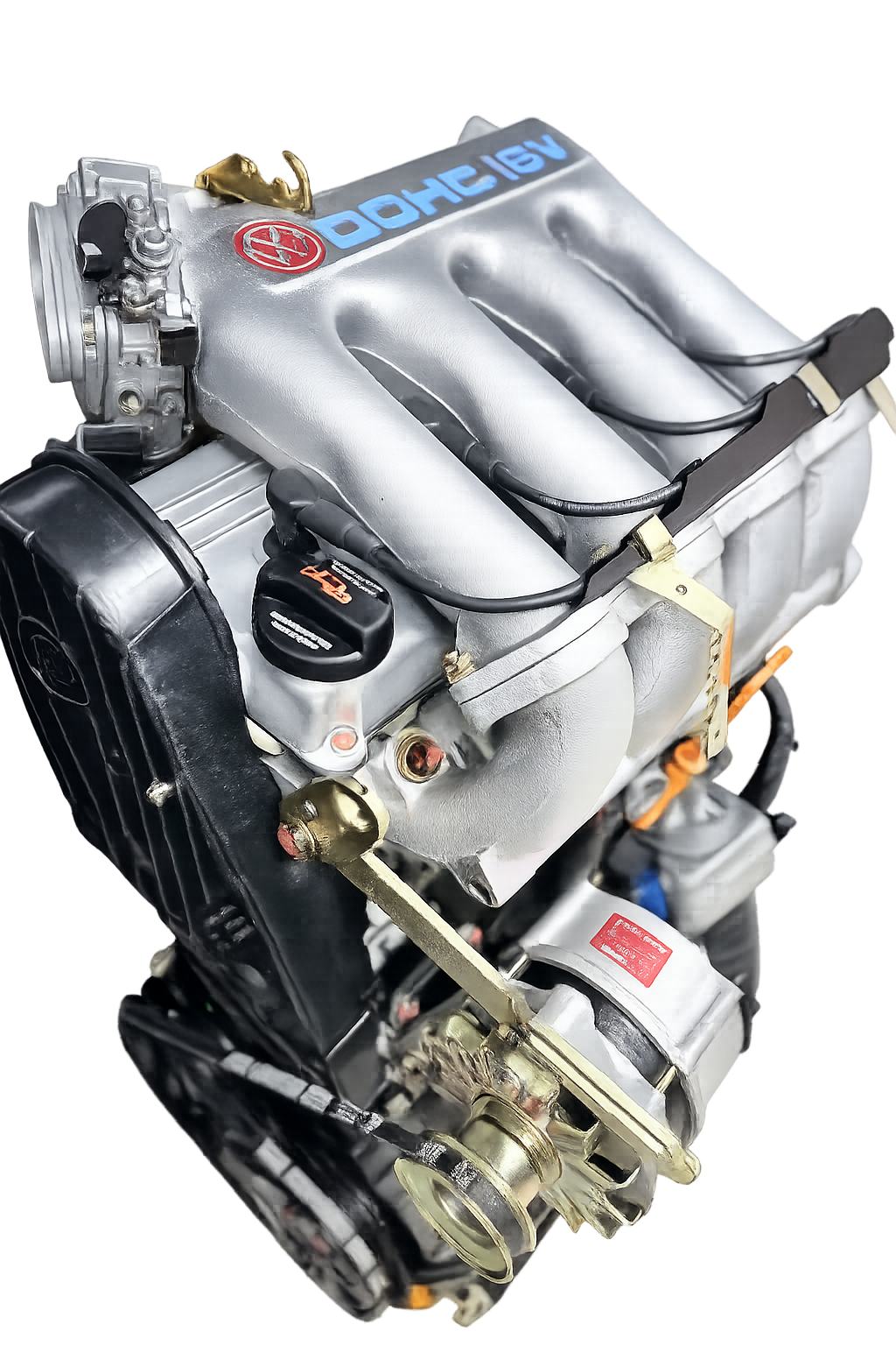 Type 19 reconditioned 1.8 KR 16V engine — three-quarter studio shot showing OEM Bosch ignition, 16V intake manifold and ancillaries